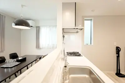 a kitchen with a sink and a counter top at Mi-Villa Kami-Ikebukuro in Tokyo