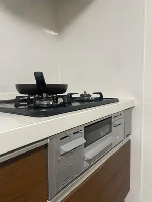 a kitchen with a stove top oven in a kitchen at The Ritz\u672c\u753a in Tokyo