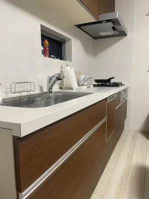a kitchen with a sink and a counter top at The Ritz\u672c\u753a in Tokyo
