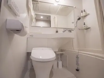 a bathroom with a toilet and a sink and a mirror at ELE HOTEL Higashi Ueno - Vacation STAY 07985v in Tokyo