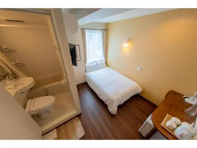 a small bathroom with a toilet and a sink at ELE HOTEL Higashi Ueno - Vacation STAY 08002v in Tokyo