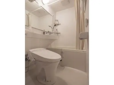 a bathroom with a toilet and a sink and a tub at ELE HOTEL Higashi Ueno - Vacation STAY 08002v in Tokyo