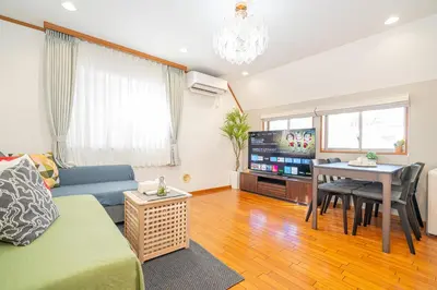 a living room with a couch and a table at ZSF-Minaminagazaki House-TS0317 in Tokyo