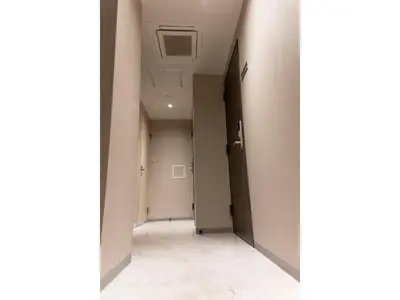 an empty corridor in an office building with a ceiling at ELE hotel Ginza East - Vacation STAY 15879v in Tokyo