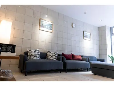 a waiting room with couches against a wall at ELE hotel Ginza East - Vacation STAY 15879v in Tokyo