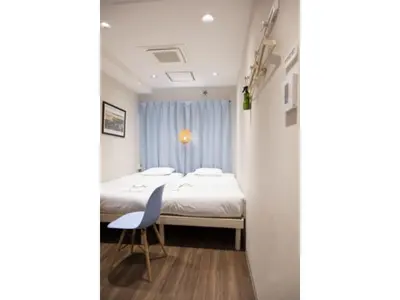 a small room with a bed and a chair at ELE hotel Ginza East - Vacation STAY 15912v in Tokyo