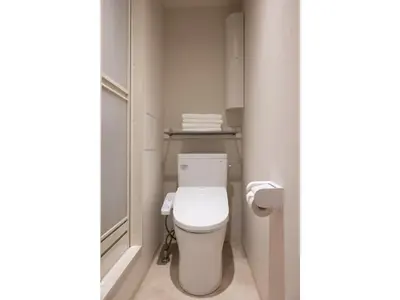 a small bathroom with a toilet and towels at ELE hotel Ginza East - Vacation STAY 15912v in Tokyo