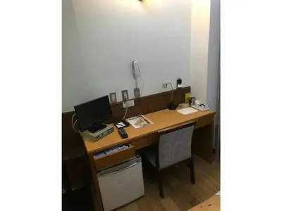 an office with a desk with a computer on it at Business Hotel Crescent - Vacation STAY 49310v in Tokyo