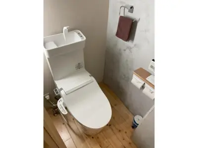 a bathroom with a white toilet and a sink at Business Hotel Crescent - Vacation STAY 49965v in Tokyo