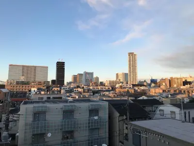 a view of a city skyline with tall buildings at Business Hotel Crescent - Vacation STAY 49965v in Tokyo