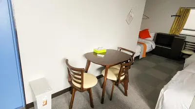 a small table and two chairs in a room at Mamada Building - Vacation STAY 17009 in Tokyo