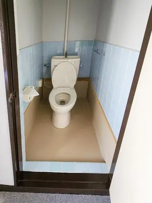 a bathroom with a toilet with blue tiles at Mamada Building - Vacation STAY 17009 in Tokyo