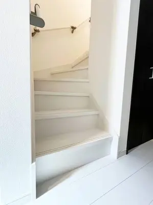 a closet with white stairs in a room at Good access 3LDK 15 people! Spacious room in Tokyo