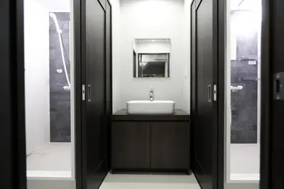 a bathroom with a sink and a mirror at KINO\u6d45\u8349b\u68df in Tokyo