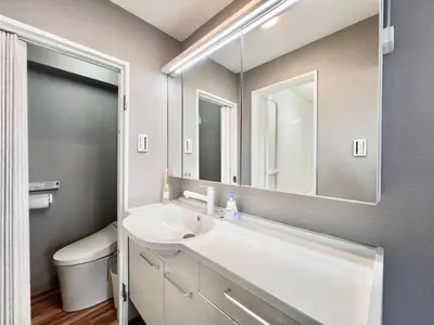 a white bathroom with a sink and a mirror at JUN \u6b4c\u821e\u4f0e\u753a10Floor-SJ0098 in Tokyo