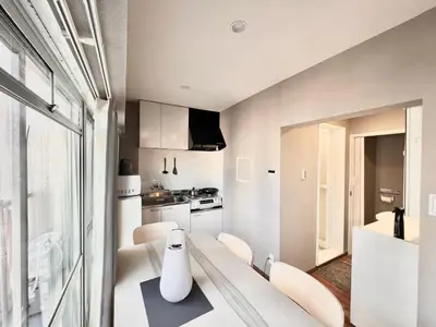 a kitchen with a table and chairs in a room at JUN \u6b4c\u821e\u4f0e\u753a10Floor-SJ0098 in Tokyo