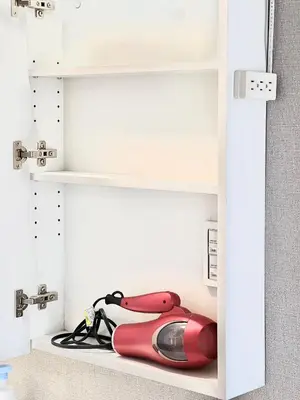 a red object is sitting on a shelf at JUN \u6b4c\u821e\u4f0e\u753a10Floor-SJ0098 in Tokyo