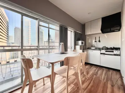 a kitchen and dining room with a table and chairs at JUN \u6b4c\u821e\u4f0e\u753a10Floor-SJ0098 in Tokyo
