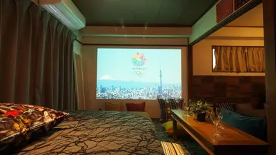 a room with a bed and a large window at Shinjuku 3 min walk from station projector #OH5 in Tokyo