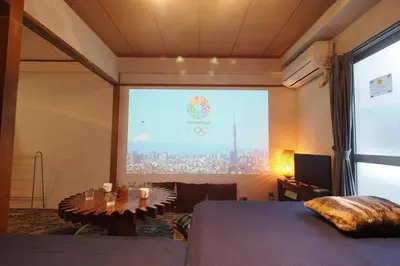 a bedroom with a large window with a view of a city at Shinjuku 3 min walk from station #projector OH2-3 in Tokyo