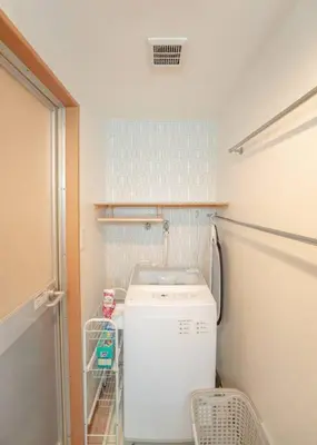 a small kitchen with a white refrigerator in a room at 12 MIN walk to Shinjuku STR ,6 MIN Higashishinjuku ,nearest kabukicho ,shinjuku oen, in Tokyo