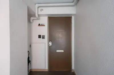 a hallway with a door in a room at 12 MIN walk to Shinjuku STR ,6 MIN Higashishinjuku ,nearest kabukicho ,shinjuku oen, in Tokyo