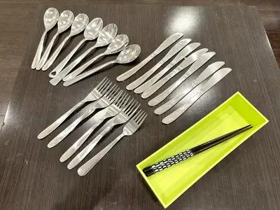 a group of forks and spoons on a table at \u30a2\u30f3\u30c9\u30b9\u30c6\u30a4\u3059\u3082\u3046\u30db\u30c6\u30eb402 in Tokyo