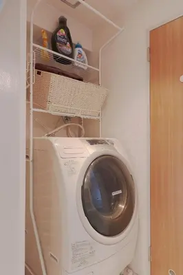 a washer and dryer in a laundry room at V Close to Shinjuku Kabukicho Korean Town FrWIFI E in Tokyo