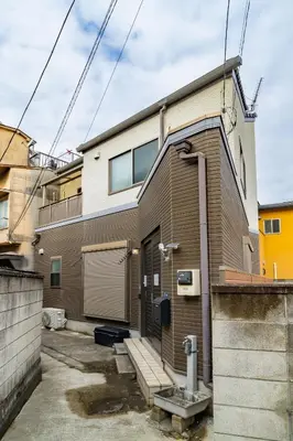 a brick house with a door on the side of it at 88, Kanegafuchi 3A, Entire house for rent, \u9418\u30f6\u6df53A in Tokyo