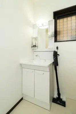 a bathroom with a white sink and a mirror at 88, Kanegafuchi 3A, Entire house for rent, \u9418\u30f6\u6df53A in Tokyo