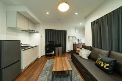 a living room with a couch and a table at 88, Kanegafuchi 3A, Entire house for rent, \u9418\u30f6\u6df53A in Tokyo