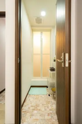 a hallway with a door leading to a room at 22, Itabashi, Entire house for rent, \u677f\u6a4b in Tokyo