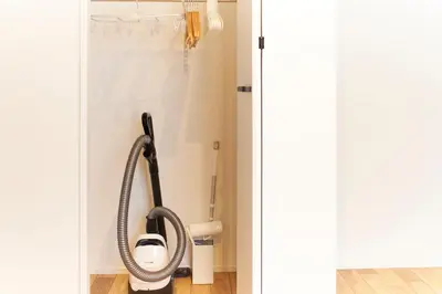 a shower in a bathroom with a hose at Frontier Comfort Kitaikebukuro by Tranova in Tokyo