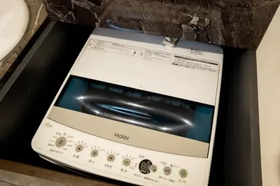 a microwave oven sitting on top of a counter at Premier suite Baron Shinjuku West in Tokyo