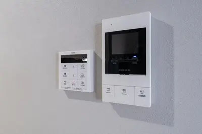 a white object on a wall with a control panel at Provence Hotel in Tokyo