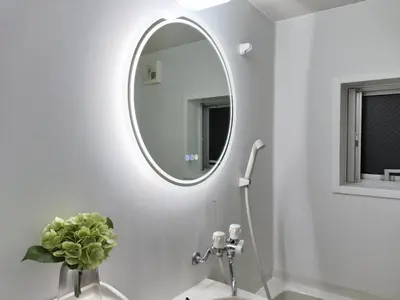 a bathroom with a round mirror and a sink at D22\u65b0\u5bbf\u6700\u4e2d\u5fc3 \u4e24\u5ba4 \u65b0\u5927\u4e45\u4fdd\u7ad95\u5206-2 rooms Shinjuku center 5 mins to ST Max 4P \u65b0\u5bbf \u6d89\u8c37 \u8868\u53c2\u9053 \u6c60\u888b \u4e0a\u91ce \u4ee3\u4ee3\u6728 \u94f6\u5ea7 \u539f\u5bbf in Tokyo