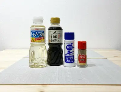 a group of bottles of vinegar and spices on a table at Akariya Asakusa in Tokyo