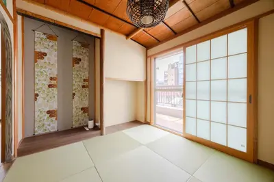 an empty room with a large window at Fit-Inn\u7530\u539f\u753a in Tokyo
