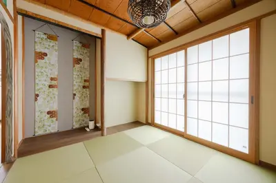 an empty room with a large window at Fit-Inn\u7530\u539f\u753a in Tokyo