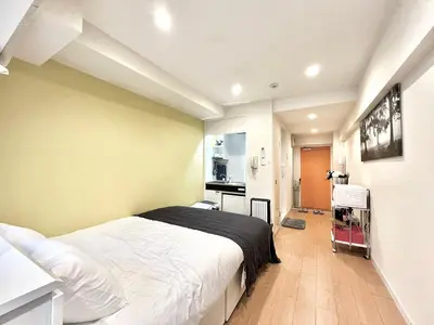 a bedroom with a large bed in a room at kabukicho 317 SJ0276 in Tokyo
