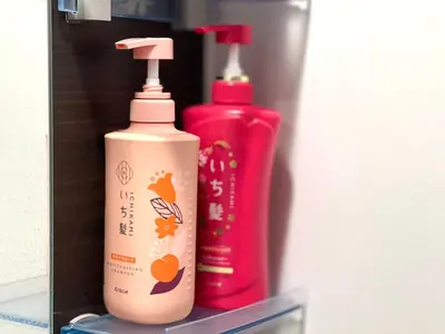 two bottles ofodorizers are sitting on a shelf at kabukicho 317 SJ0276 in Tokyo