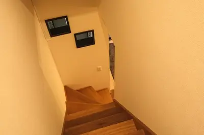 an overhead view of a stairway in a building at Urban House Nakano in Tokyo
