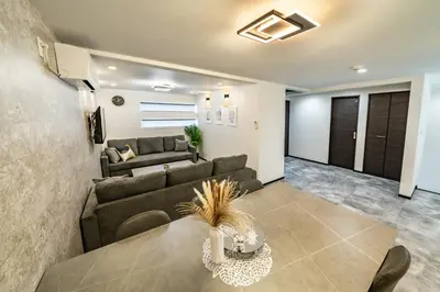 a living room with a couch and a table at 91, Honancho A, Entire house for rent, \u65b9\u5357\u753aA in Tokyo