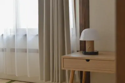 a lamp on a table next to a window at \u68ee\u4e0b\u5225\u90b8 in Tokyo