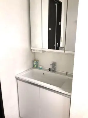 a white bathroom with a sink and a mirror at 13, Yotsugi 1, Entire house for rent, \u56db\u3064\u67281 in Tokyo