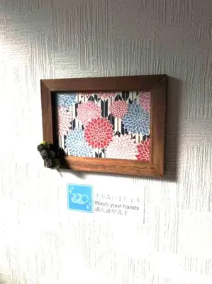 a picture of a quilt hanging on a wall at 13, Yotsugi 1, Entire house for rent, \u56db\u3064\u67281 in Tokyo