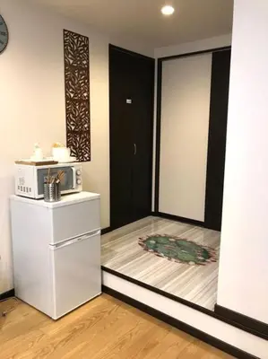 a kitchen with a refrigerator and a microwave at 13, Yotsugi 1, Entire house for rent, \u56db\u3064\u67281 in Tokyo
