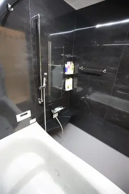 a bathroom with a bath tub and a toilet at XD54321 The 100-square-meter super-large villa near Tokyo Skytree can accommodate 8 people! in Tokyo