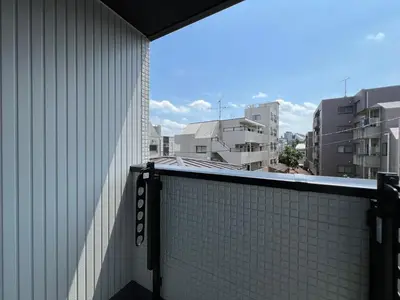 a balcony of a building with a view of buildings at Shibuya House-SY0108 in Tokyo