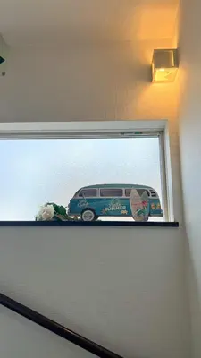 a picture of a car on a wall at JING HOUSE Shintakasago - Vacation STAY 17117 in Tokyo